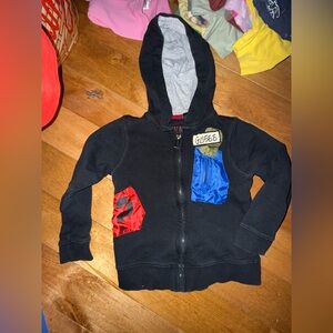 Guess Kids Black Hoodie with Red and Blue Pockets